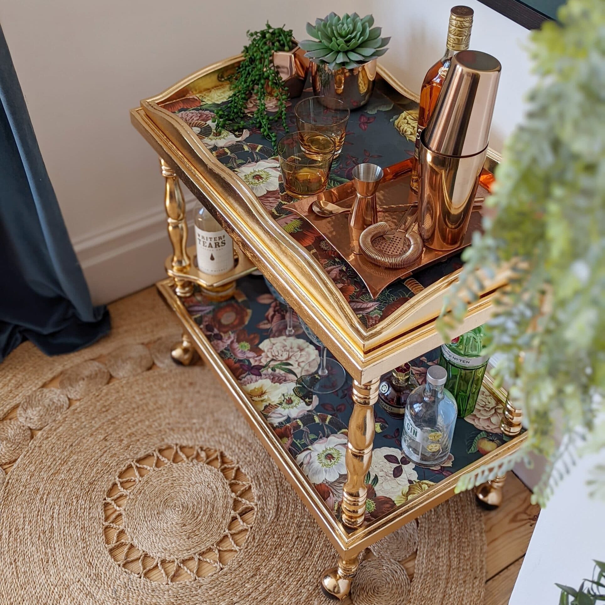 refinished gold drinks trolley in a sustainable luxury interior