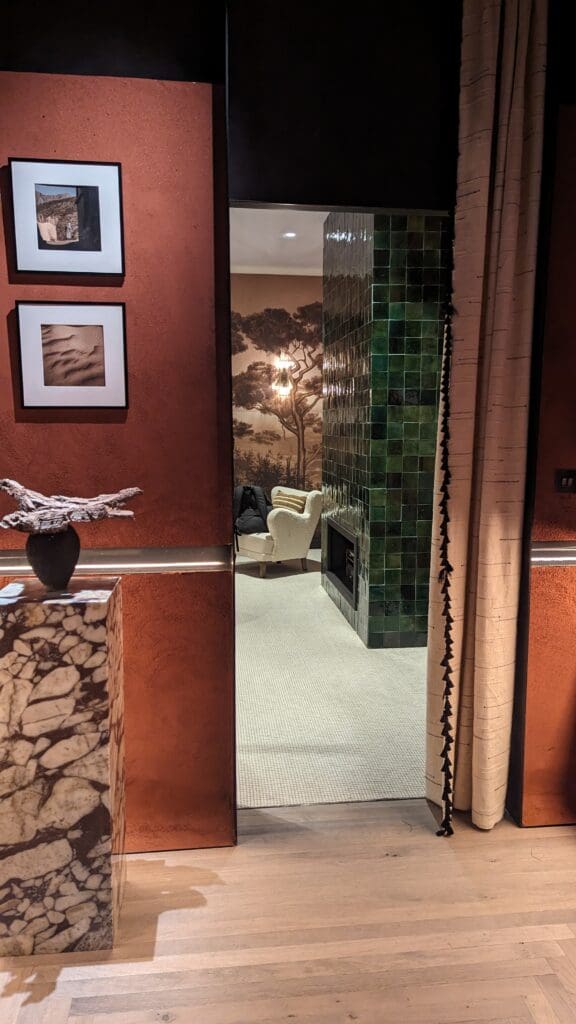 Doorway with teracotta walls and marble plinth