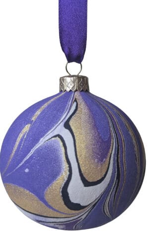Luxury handmade marbled ceramic Christmas bauble decoration in purple and gold with purple satin ribbon